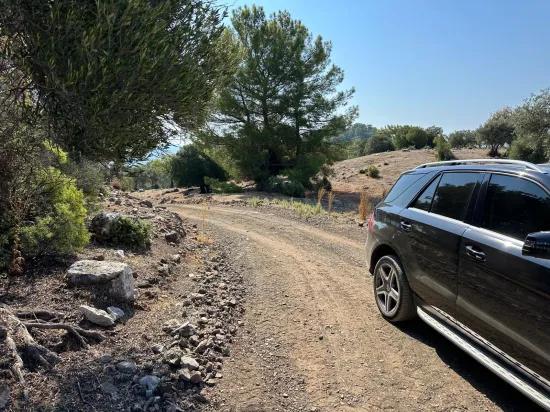 In Çandır mit Meerblick 21.000 m2 zu verkaufen 2b Feld