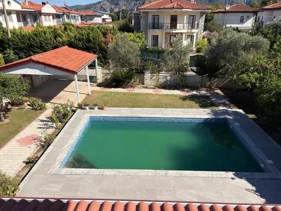 в Dalyan Gülpınar 520m2 участок внутри 4+1 на продажу вилла