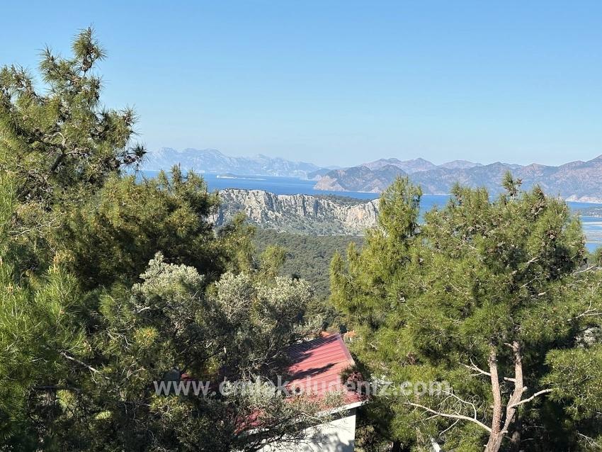 Gökbel'de Köy Yerleşik Alanı İçerisinde Deniz Manzaralı 1000m2 Satılık Arazi